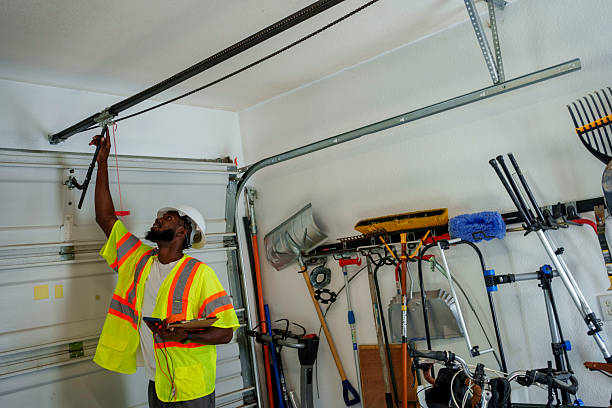 Professional Garage Door Panel Replacement technician working in Bismarck, ND